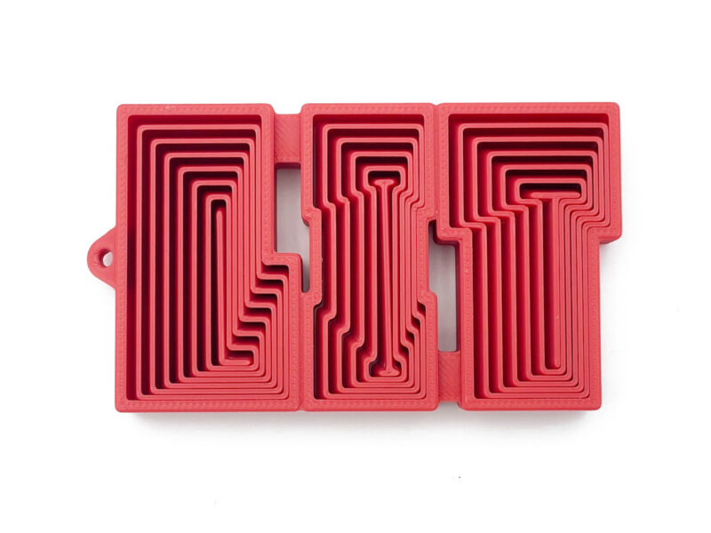 RIZZ fidget toy in blue, charismatic 3D-printed flexible word with layered letters
