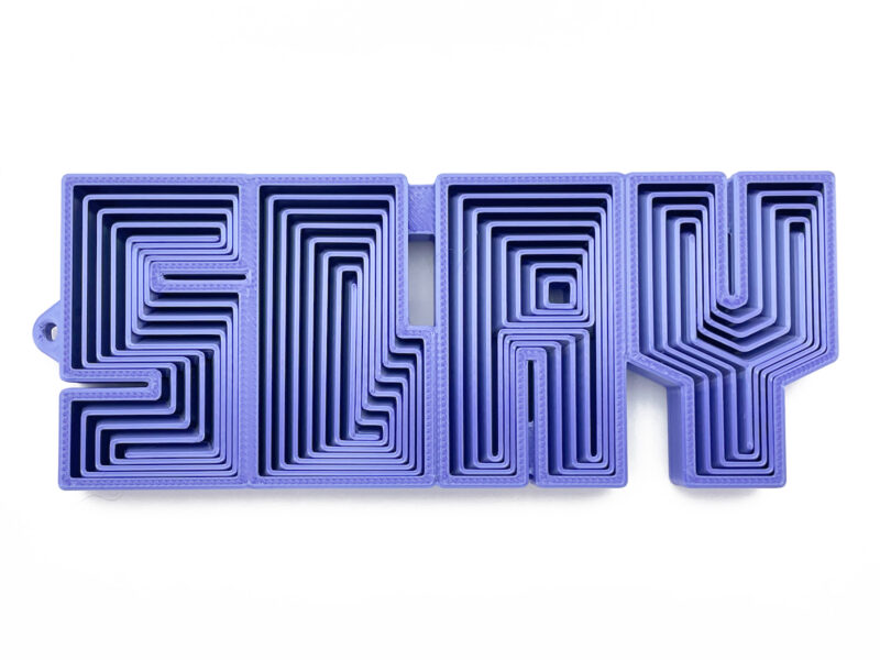 Slay nested fidget toy in purple plastic